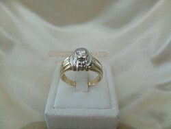 Yellow - white gold ring with 0.35 Ct brill