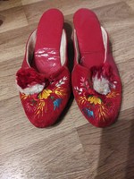 Szeged red slippers in size 39 and up.