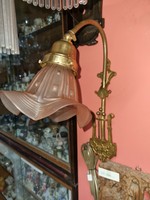 Old restored copper wall arm for piano