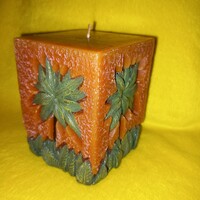 Cube-shaped candle. Home accessory, decoration.