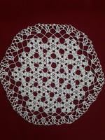 Crochet lace tablecloth with a geometric pattern