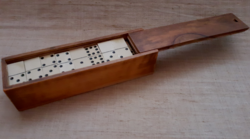 Old domino game in a sophisticated hardwood box