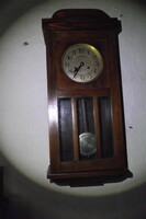 Art-deco half-baked wall clock.