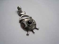 Designer silver pendant with a witch's pot, in the shape of a magic pot