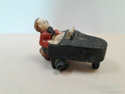 Dr. Rank ceramic 1920s-30s, little boy playing the piano. Glazing defect approx. 13 X 10 cm x 9 cm. Rarity.