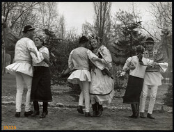 Larger size, photo art work by István Szendrő. Young people in the national costume of Giimeszözéplok,