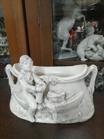 Old glazed ceramic boy scout boy in a boat with a figural bowl, centerpiece..24 Cm.