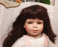 Beautiful porcelain doll for sale with a small defect - 56 cm