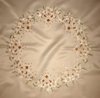 Beautiful embroidered silk tablecloth with a romantic flower pattern