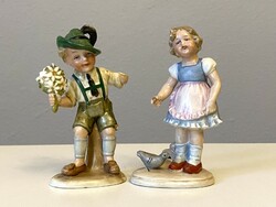 2 Defective painted Bertram porcelain statues boy and girl
