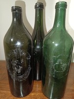Budafoki borváros három db patinás palackjai.