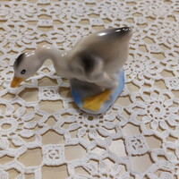 Marked porcelain pecking duck