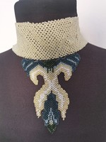 Pearl necklaces woven by an artisan