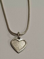 Silver snake necklace with silver heart pendant