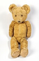 Charming antique toy teddy bear