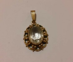 Small, vintage American pendant decorated with a crystal stone