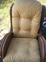 Beautiful rattan armchair with thick cushions