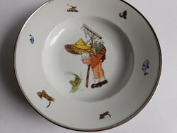 Old porcelain children's plate with stainless steel container that keeps it warm