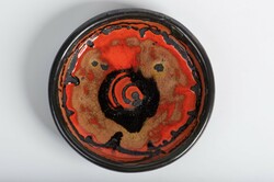 Viktor Janáky crafts glazed ceramic bowl