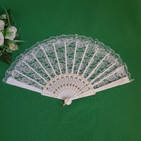 New, snow-white bridal lace fan