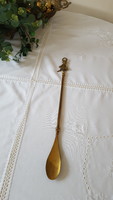 Old long brass shoe spoon with piskie figure