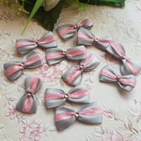 New, handmade gray-pink satin bow ornament, decoration