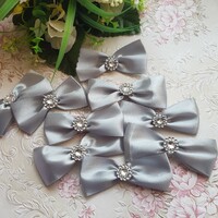 New, handmade gray satin bow ornament, decoration