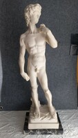 Alabaster nude statue of David on a marble plinth, 49.5 cm, 3838 gr., Plinth 12 x 16.5 cm.