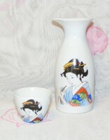 Geisha sake pouring and cup