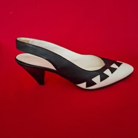 Vintage, Italian black and white women's leather shoes with straps at the back.