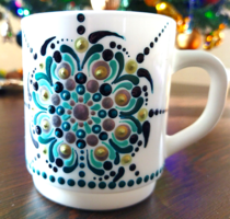 White mug with mandala pattern