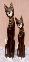 Native, tribal sculpture series from Indonesia. Cats with spotted pattern. Original craftsmanship
