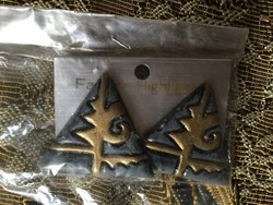 Gray bijou clip with gold/bronze pattern
