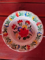 Decorative wall plate painted on porcelain