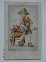 Old graphic greeting card - boy with wheelbarrow of flowers (1942)