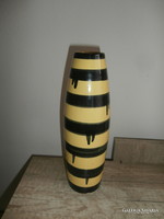 Retro vase with yellow and black stripes