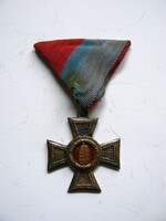 Old unidentified medal on triangular silk ribbon