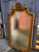 Gilded French mirror with putto decoration