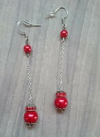 Red pearl earrings on a long chain
