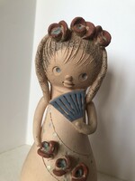 Marked ceramic little girl with fan