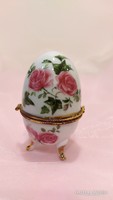 Porcelain bonbonier in the shape of an egg with a rose decoration