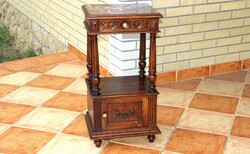 Carved bedside table with marble top