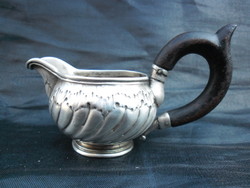 Antique, silver, marked, spout. With ebony lugs, marked on the bottom. Flawless collector's item.