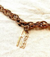 Gold-colored bijou bracelet with pendant, a legacy of Inke László