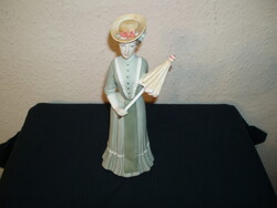 Royal dux lady with umbrella in green dress, painted biscuit porcelain, marked, flawless, m: 23.5 cm