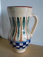 An unidentified goblet jug ceramic folk in good condition with a pepita pattern