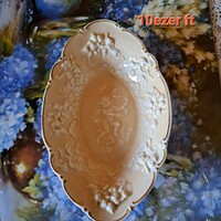 Oval porcelain bowl with embossed pattern