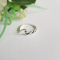 New, wave-decorated ring - usa 7 / eu 54 / ø17.5mm