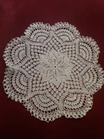 Old lace tablecloth with a fan pattern