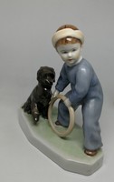 Zsolnay porcelain, a boy playing with a hoop!